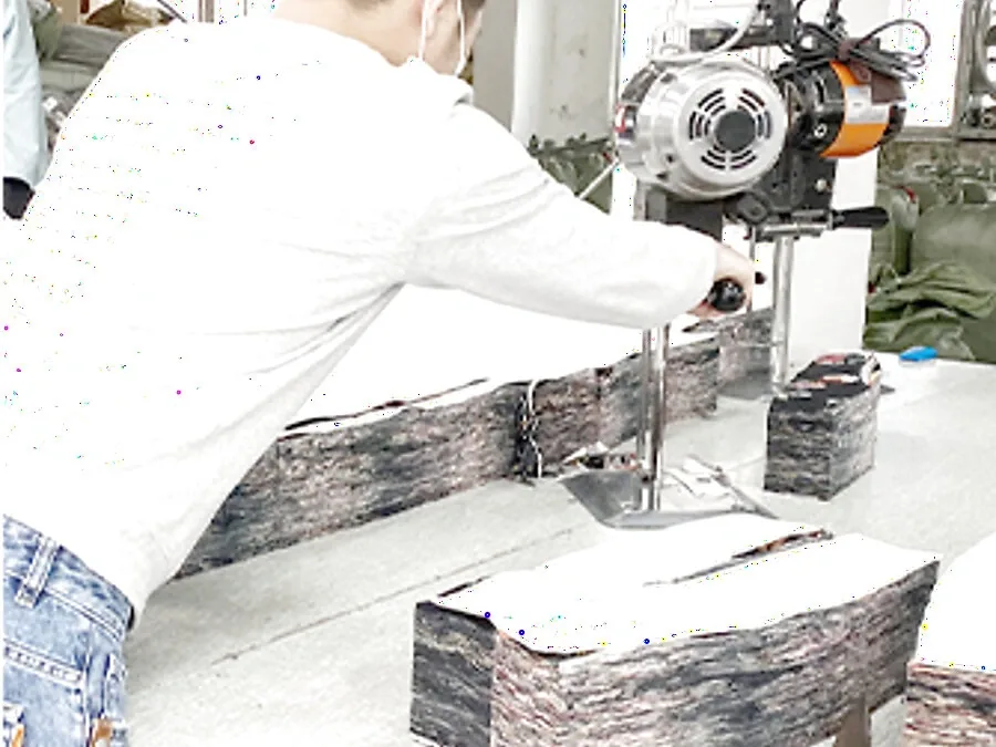 Band-knife cutting of stacked fabric plies at the Humen factory