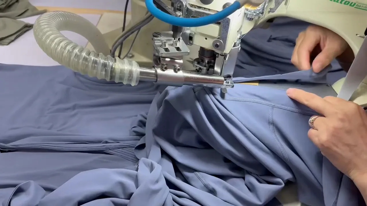 Flatlock seaming of stretch knit fabric at the Humen factory